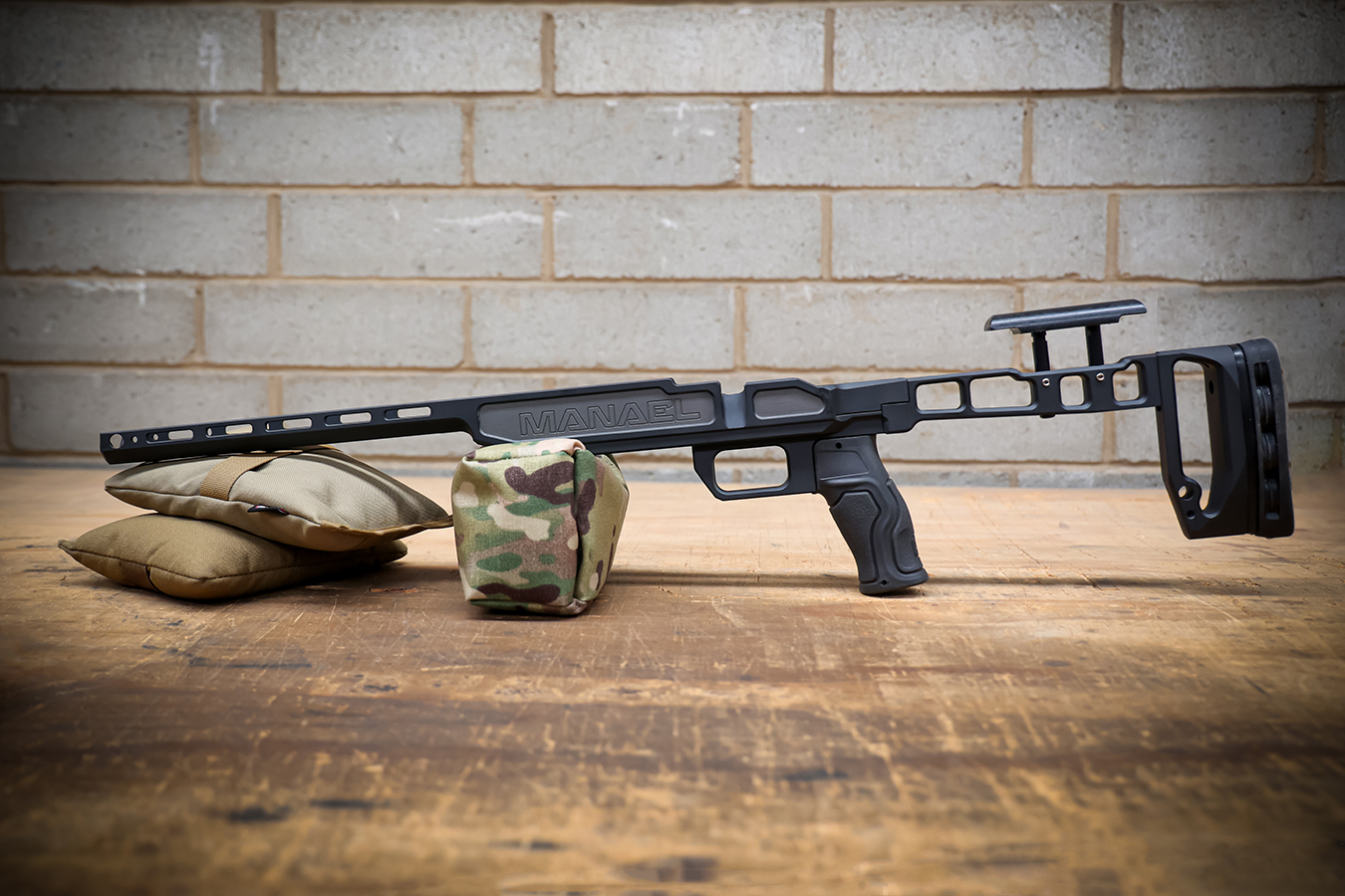 Lightweight MANAEL Hunter Chassis showing smooth snag-free profile and cheek riser